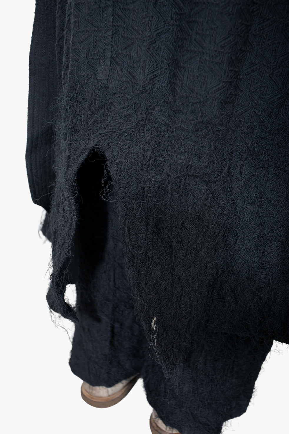 Oversized coat scratched edges