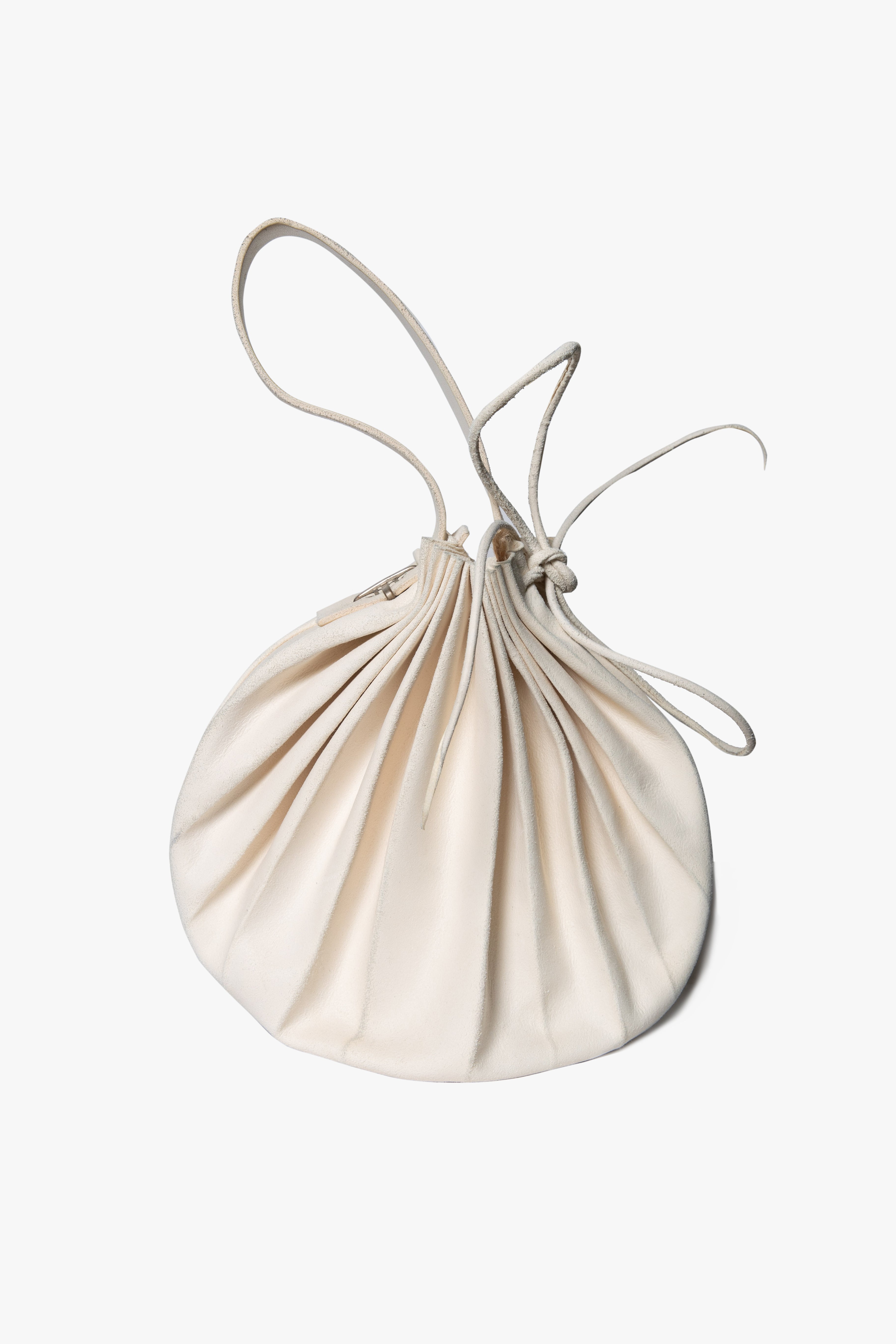 Small shell hand bag w/big silver corss